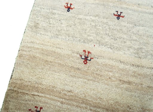 Backside of handmade New Persian Gabbeh rug showing knot structure and weave density