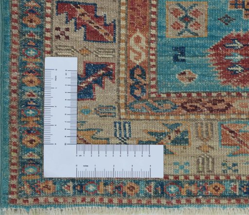 Corner detail of New Kazak rug showing border pattern and Wool pile