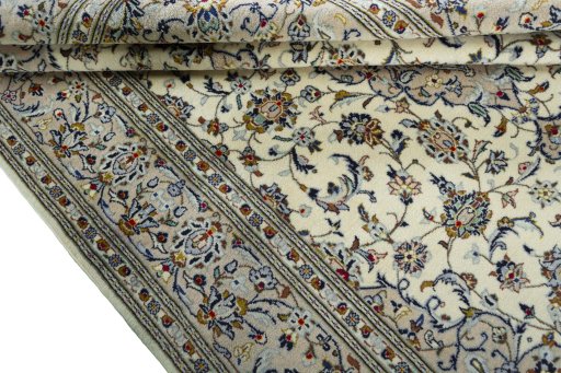 Close-up detail of 2000s Kashan rug from Iran / Persia showing Wool weave
