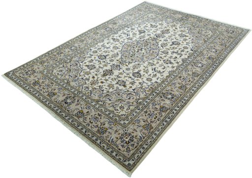 Corner detail of 2000s Kashan rug showing border pattern and Wool pile