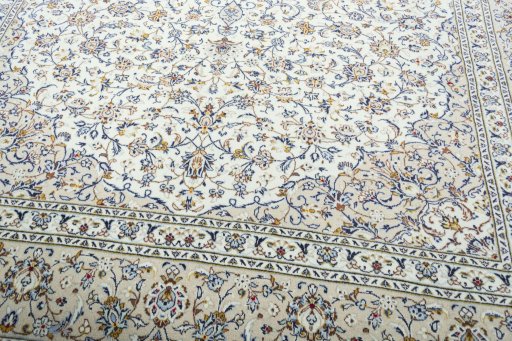 Close-up detail of 2000s Kashan rug from Iran / Persia showing Wool weave