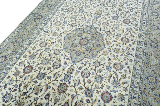Backside of handmade New Kashan rug showing knot structure and weave density