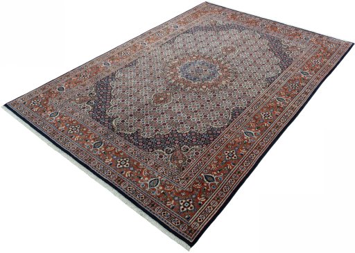 Corner detail of 2000s Moud rug showing border pattern and Wool pile