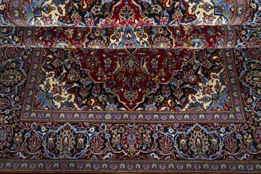 Close-up detail of 2000s Kashan rug from Iran / Persia showing Cork weave