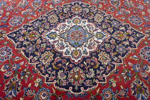 Central medallion detail of New Kashan rug from Iran / Persia