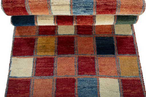 Full view of 2000s Persian Gabbeh rug from Pakistan, 255 × 90 cm in Multi Color tones