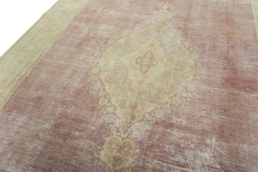 Backside of handmade 1950s Vintage rug showing knot structure and weave density