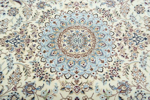Central medallion detail of 2000s Nain rug from Iran / Persia