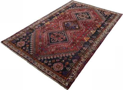 Corner detail of 2000s Shiraz rug showing border pattern and Wool pile