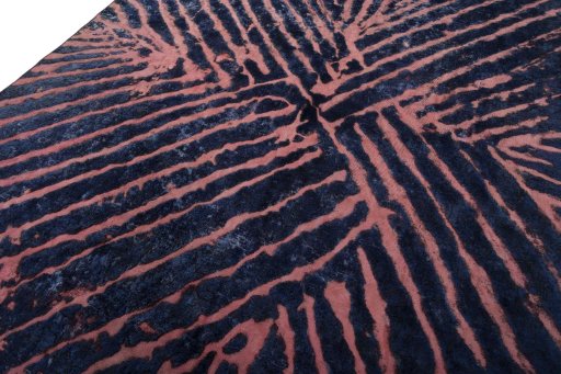 Backside of handmade 1970s Vintage rug showing knot structure and weave density