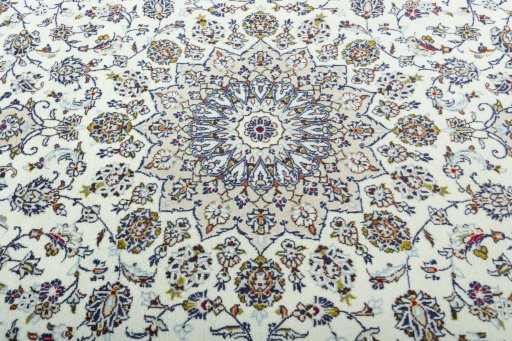 Central medallion detail of 2000s Kashan rug from Iran / Persia