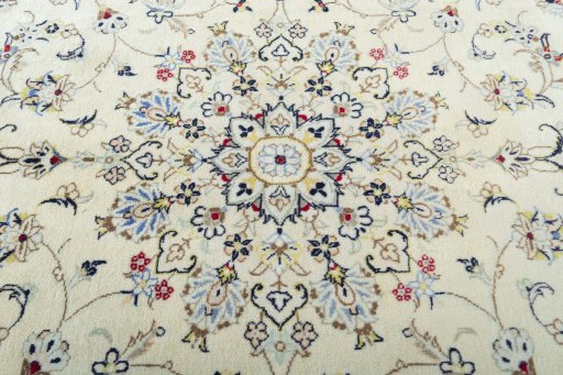 Central medallion detail of 2000s Kashan rug from Iran / Persia