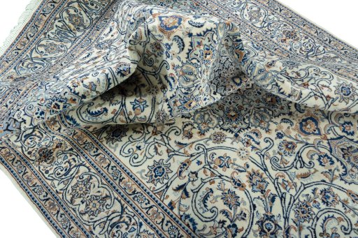 Surface texture of 2000s Kashmar rug with natural Wool and intricate pattern