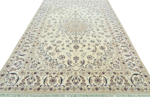 Surface texture of 2000s Nain rug with natural Wool and intricate pattern