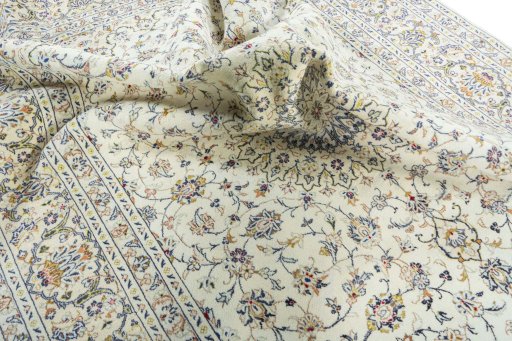 Surface texture of 2000s Kashan rug with natural Wool and intricate pattern