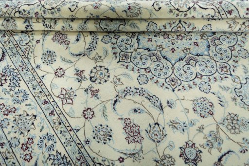 Close-up detail of 2000s Nain rug from Iran / Persia showing Wool weave