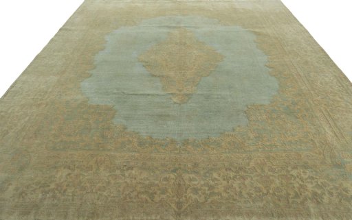 Surface texture of 1970s Vintage rug with natural Wool and intricate pattern
