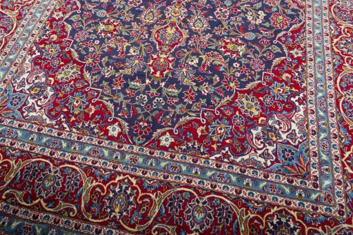 Close-up detail of 2000s Kashan rug from Iran / Persia showing Wool weave