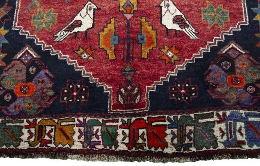 Central medallion detail of 2000s Shiraz rug from Iran / Persia