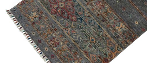 Backside of handmade New Samarkand rug showing knot structure and weave density