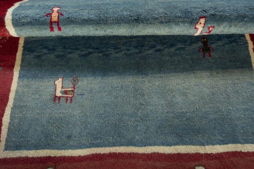 Full view of 2000s Persian Gabbeh rug from Pakistan, 198 × 155 cm in Blue tones