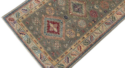 Backside of handmade New Kazak rug showing knot structure and weave density