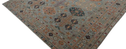Backside of handmade New Kazak rug showing knot structure and weave density