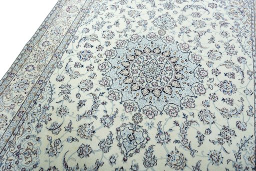 Backside of handmade 2000s Nain rug showing knot structure and weave density