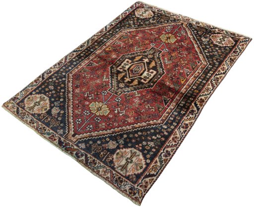 Corner detail of 2000s Shiraz rug showing border pattern and Wool pile