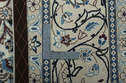 Backside of handmade 2000s Nain rug showing knot structure and weave density