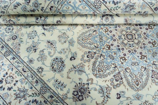 Close-up detail of 2000s Nain rug from Iran / Persia showing Wool weave