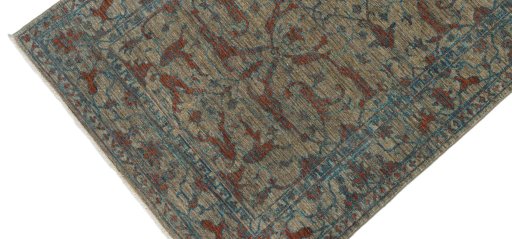 Backside of handmade New Farahan rug showing knot structure and weave density