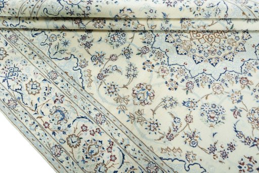Close-up detail of 2000s Nain rug from Iran / Persia showing Wool weave