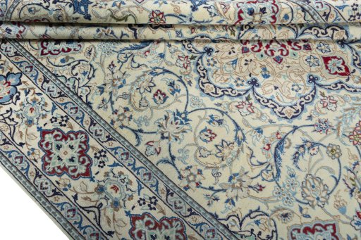 Close-up detail of 2000s Nain rug from Iran / Persia showing Wool weave