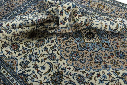 Surface texture of 2000s Kashan rug with natural Wool and intricate pattern