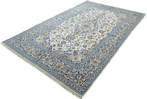 Corner detail of 2000s Kashan rug showing border pattern and Wool pile