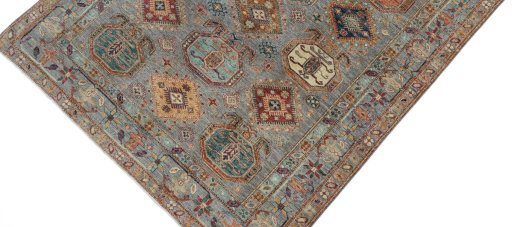 Backside of handmade New Kazak rug showing knot structure and weave density