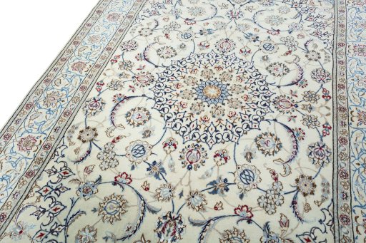 Backside of handmade 2000s Nain rug showing knot structure and weave density