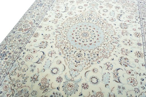 Backside of handmade 2000s Nain rug showing knot structure and weave density