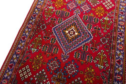 Backside of handmade 2000s Meymeh rug showing knot structure and weave density