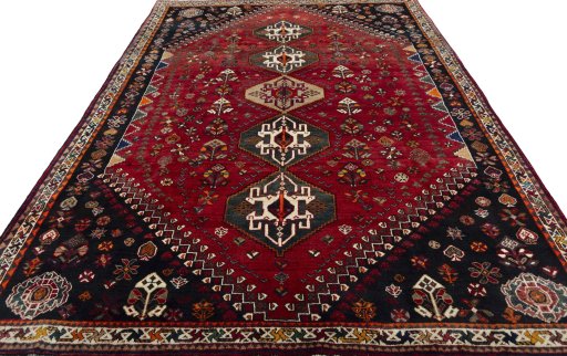 Surface texture of 2000s Shiraz rug with natural Wool and intricate pattern