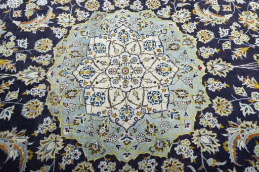 Central medallion detail of 2000s Kashan rug from Iran / Persia