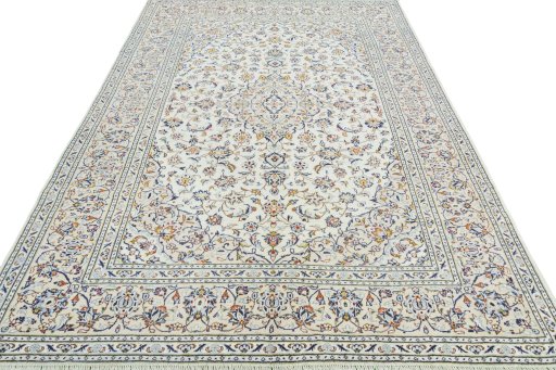 Surface texture of 2000s Kashan rug with natural Wool and intricate pattern