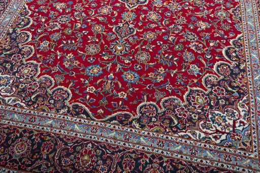 Close-up detail of 2000s Kashan rug from Iran / Persia showing Wool weave