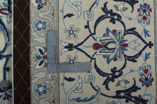 Backside of handmade 2000s Nain rug showing knot structure and weave density
