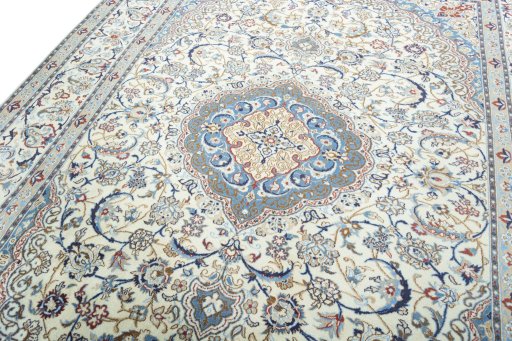 Backside of handmade 2000s Nain rug showing knot structure and weave density