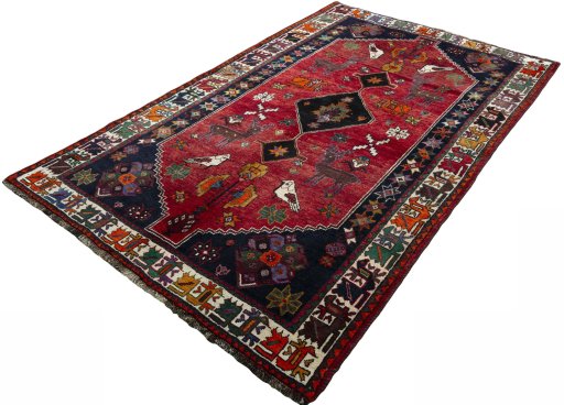 Corner detail of 2000s Shiraz rug showing border pattern and Wool pile