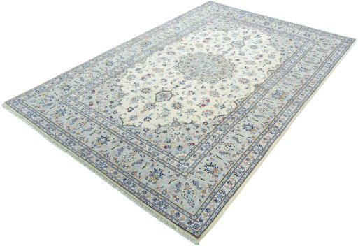 Corner detail of 2000s Kashan rug showing border pattern and Wool pile