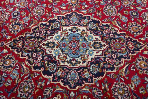 Central medallion detail of 2000s Kashan rug from Iran / Persia