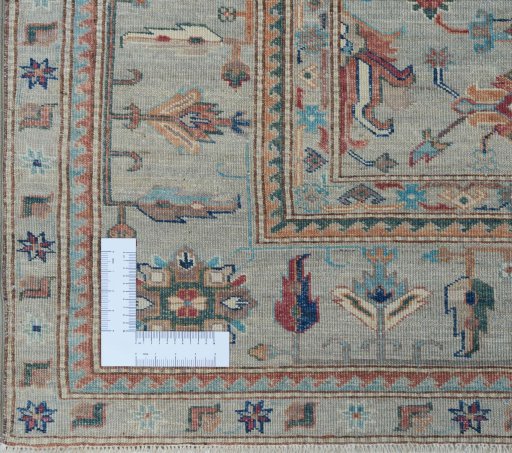 Corner detail of New Kazak rug showing border pattern and Wool pile